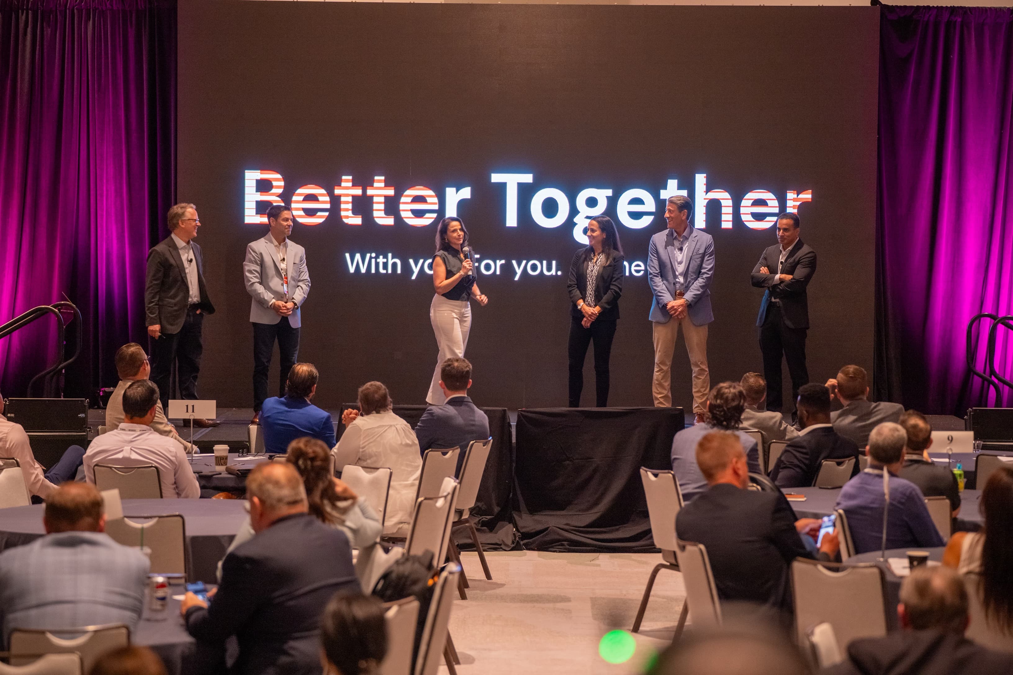 ELT on stage at 2025 CoreTrust Supplier Summit and PE Meeting